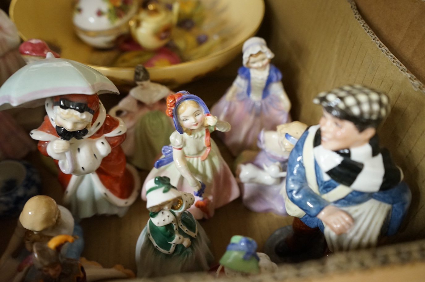 A collection of mixed ceramics to include Doulton figures, set of six Royal Albert old country roses cups and Spode plates